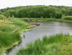 Devil's Ings Lake with canoes