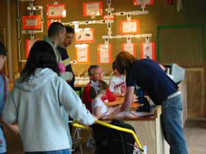 Examining the pond life using the microscopes and computers