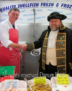 nigel berry and doncaster town crier at  the fish market in doncaster